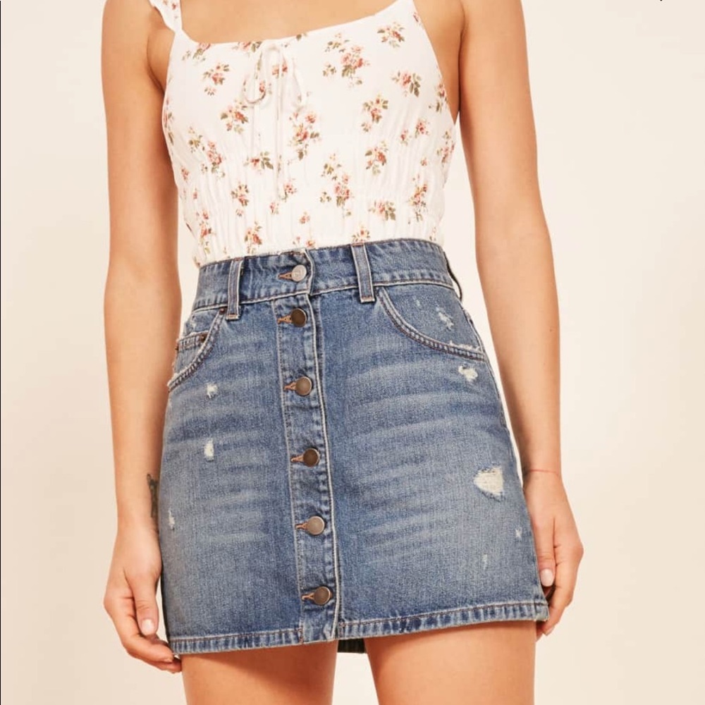 A reformation distressed denim skirt size 25.
